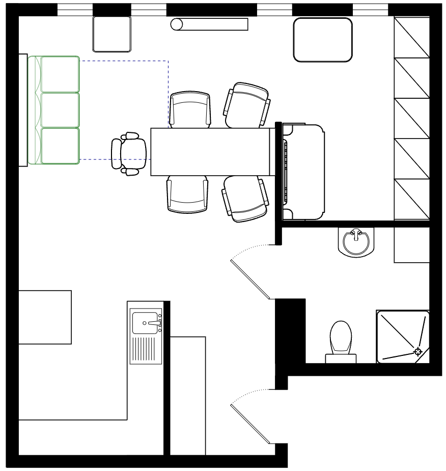 Plattegrond van de studio met uitgeklapte eettafel en vijf stoelen